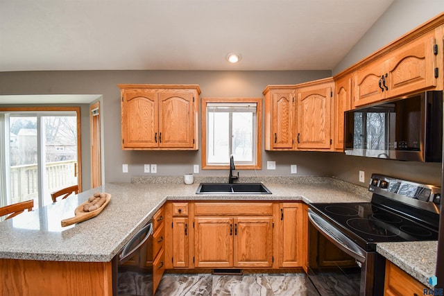 kitchen with sink, black dishwasher, range with electric stovetop, and vaulted ceiling