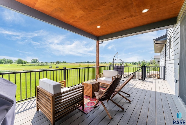 wooden deck featuring an outdoor hangout area