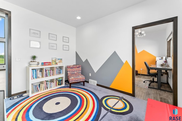 playroom featuring hardwood / wood-style flooring