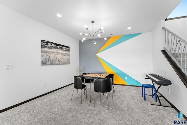 rec room with carpet flooring and a notable chandelier