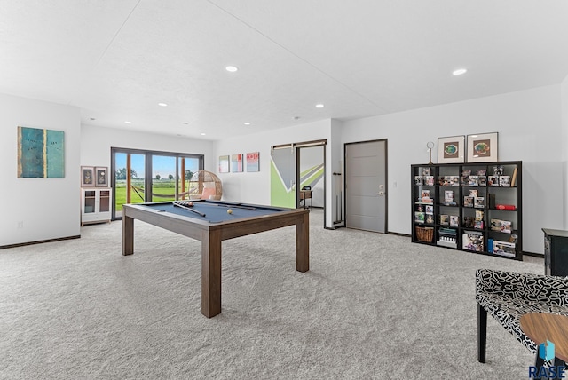 playroom with billiards, light carpet, and a barn door