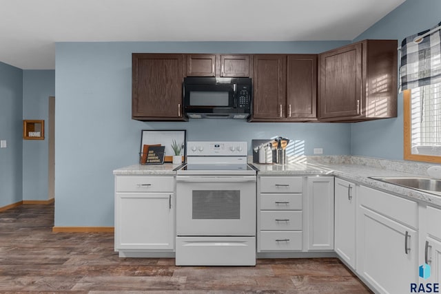 kitchen with white range with electric cooktop, white cabinets, sink, and dark hardwood / wood-style flooring