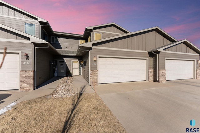 view of front of property featuring a garage