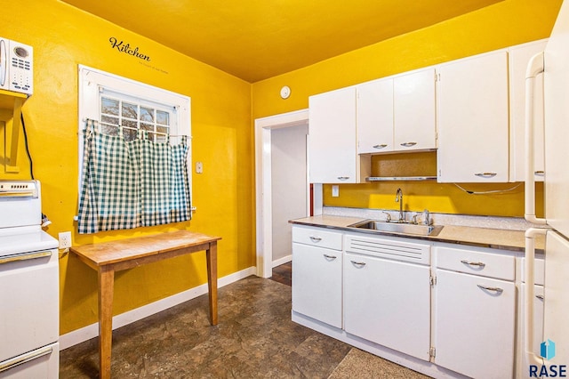 kitchen featuring white cabinetry, white appliances, and sink