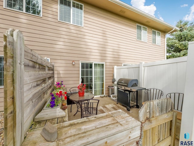 wooden deck with area for grilling