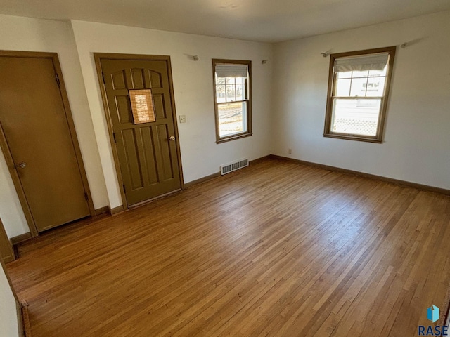 foyer with light hardwood / wood-style flooring