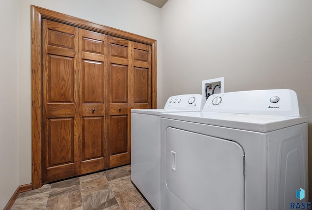 laundry room with washer and clothes dryer