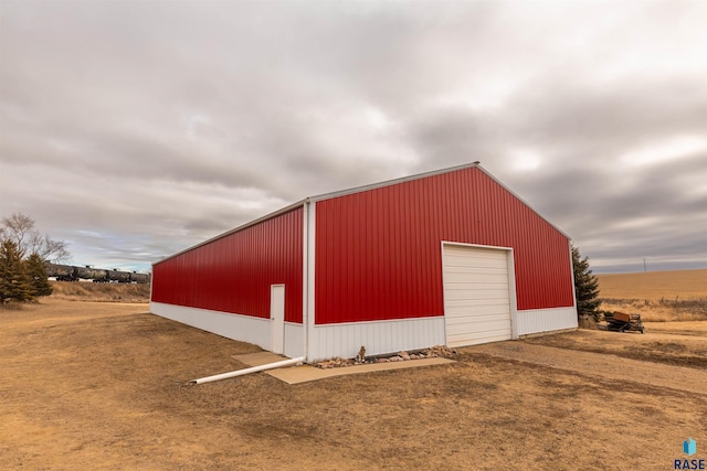 view of outdoor structure with a garage