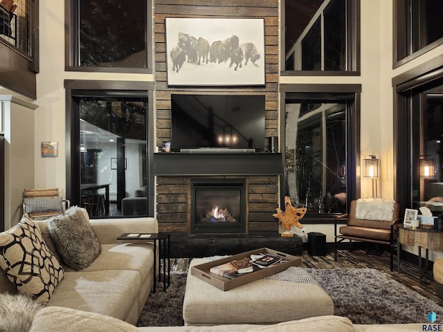 living room with a towering ceiling