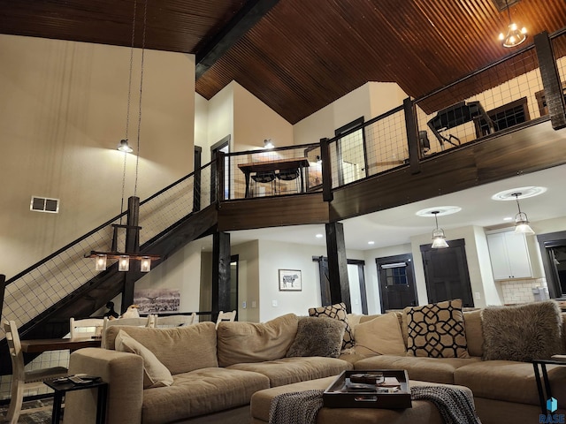 living room with wood ceiling, beam ceiling, and high vaulted ceiling