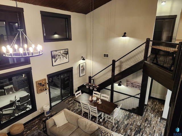 living room with a notable chandelier