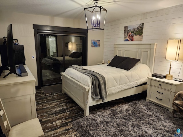 bedroom with wooden walls