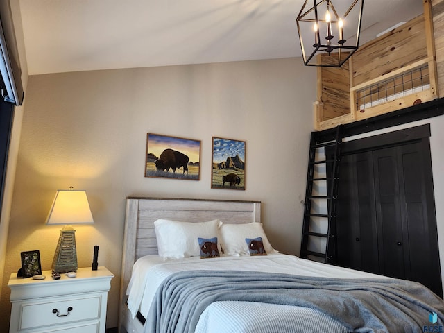 bedroom with an inviting chandelier