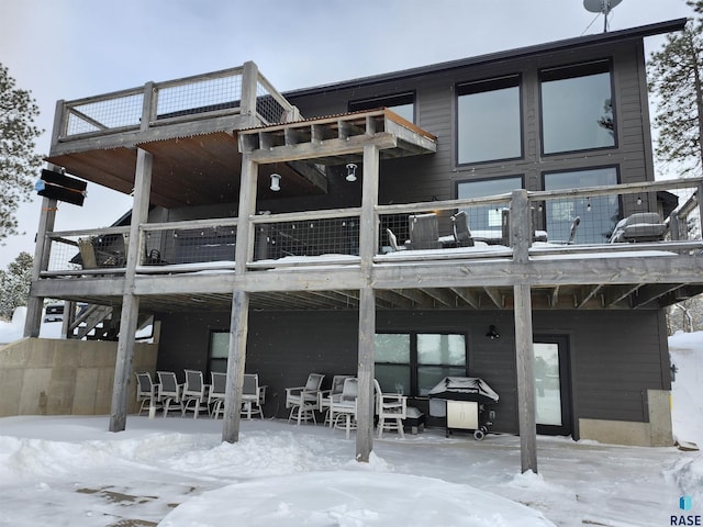 view of snow covered house