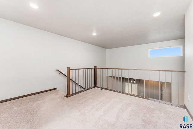 empty room with carpet flooring