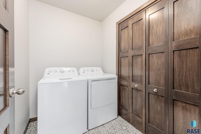 washroom with washing machine and dryer