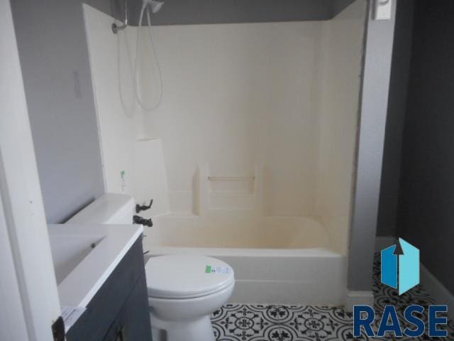 full bathroom with vanity, shower / bathing tub combination, and toilet