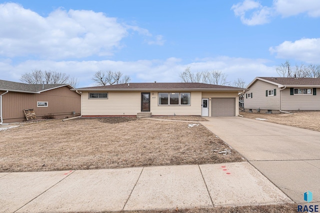 ranch-style house featuring a garage