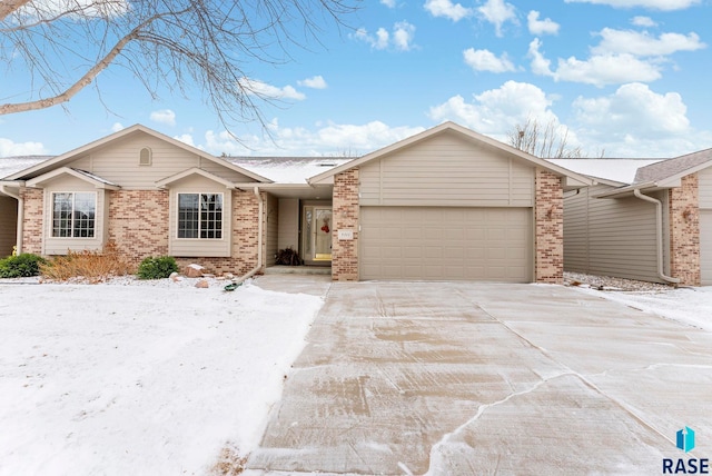 single story home with a garage