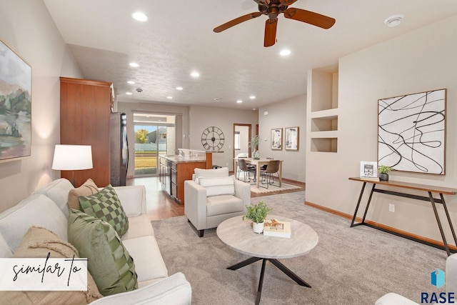 living room featuring light carpet