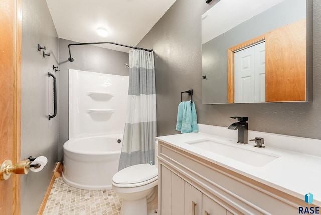 full bathroom with shower / bath combo, vanity, and toilet