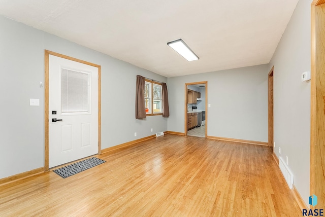 interior space with light hardwood / wood-style floors