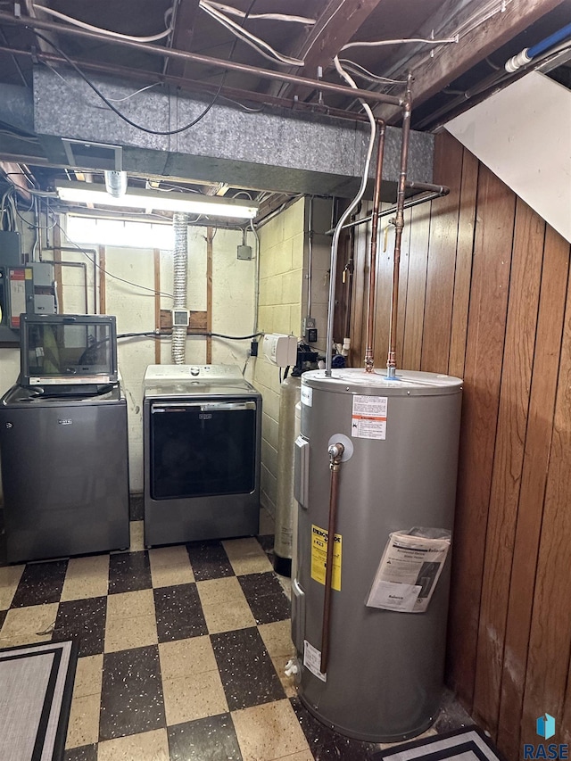 utilities featuring washer and dryer and electric water heater