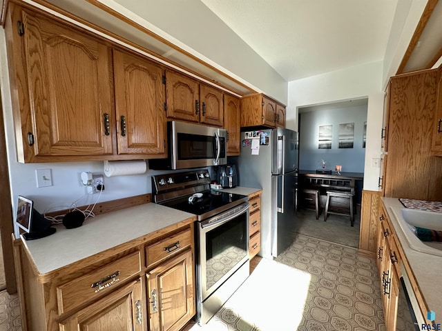 kitchen featuring sink and appliances with stainless steel finishes