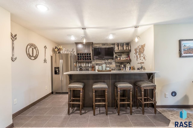 bar with stainless steel fridge