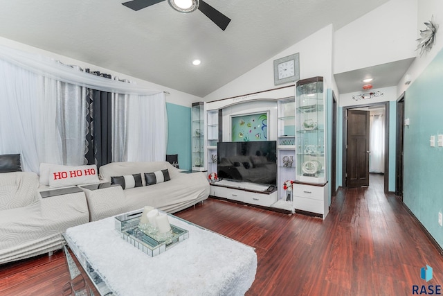 living room with dark wood-type flooring, high vaulted ceiling, and ceiling fan