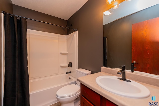 full bathroom featuring vanity, shower / bath combo with shower curtain, and toilet