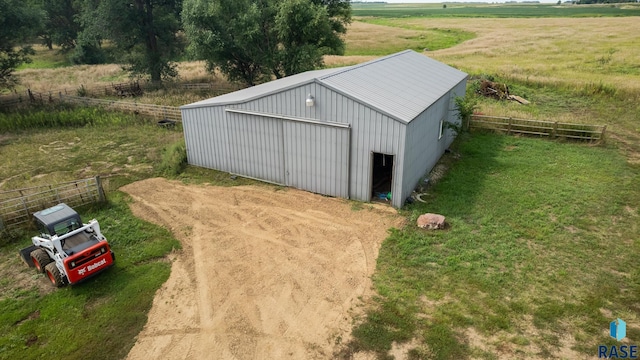 view of outdoor structure featuring a rural view