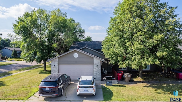 garage featuring a yard