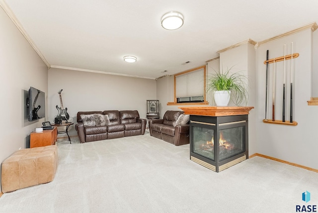 carpeted living room with crown molding and a multi sided fireplace