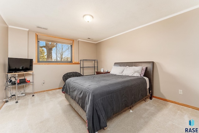 carpeted bedroom featuring crown molding