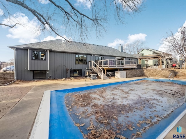 view of swimming pool featuring a gazebo and a wooden deck