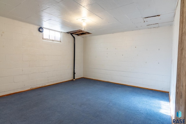 basement featuring carpet flooring