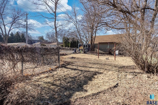 view of yard with a garage