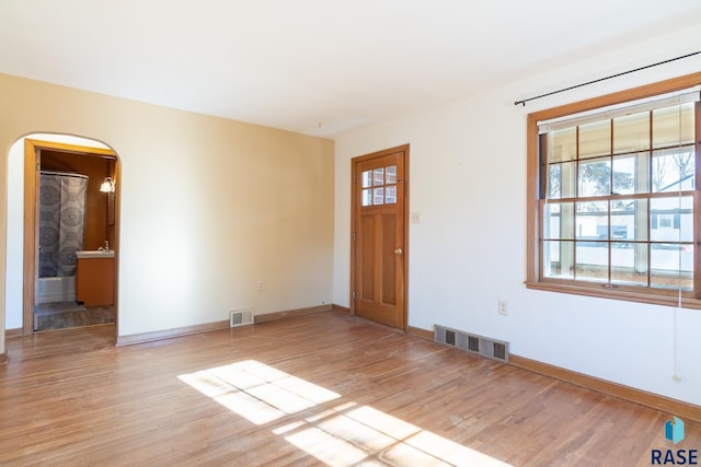 entrance foyer with light hardwood / wood-style floors