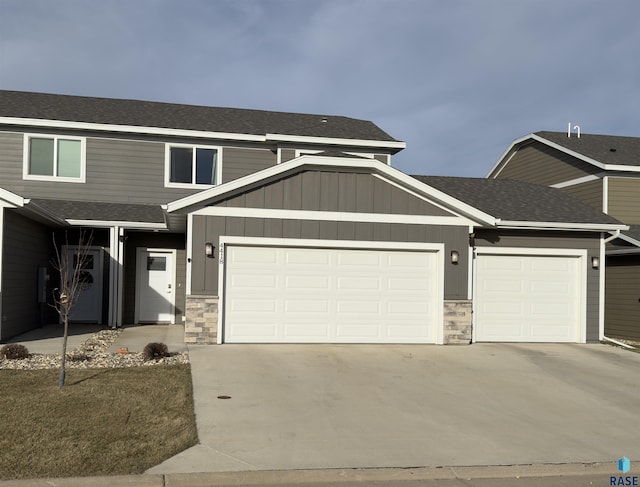 view of front of property with a garage