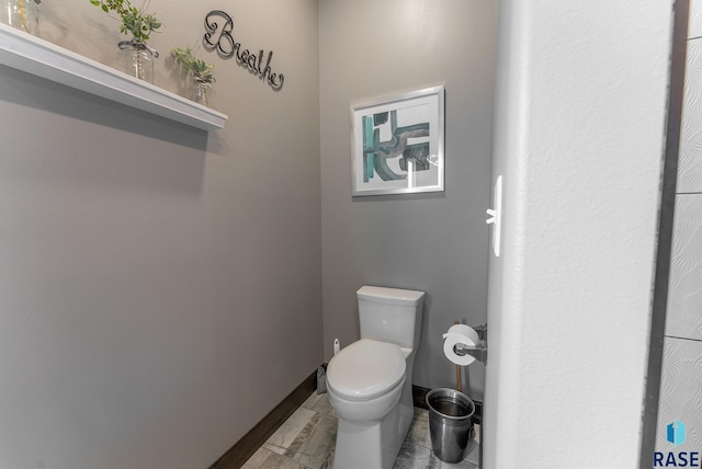 bathroom featuring toilet