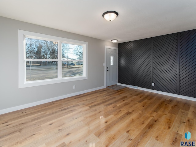 foyer with light hardwood / wood-style flooring