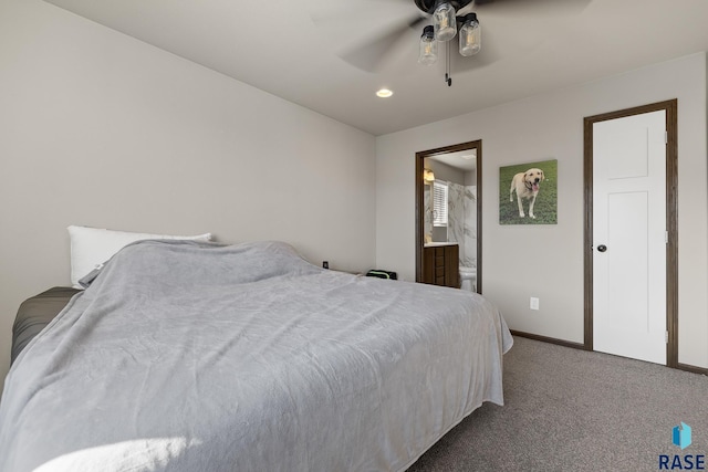 bedroom featuring carpet, connected bathroom, and ceiling fan