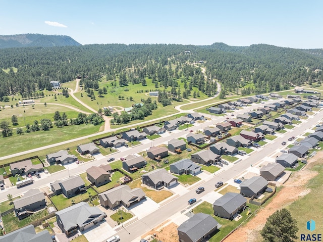 drone / aerial view featuring a mountain view