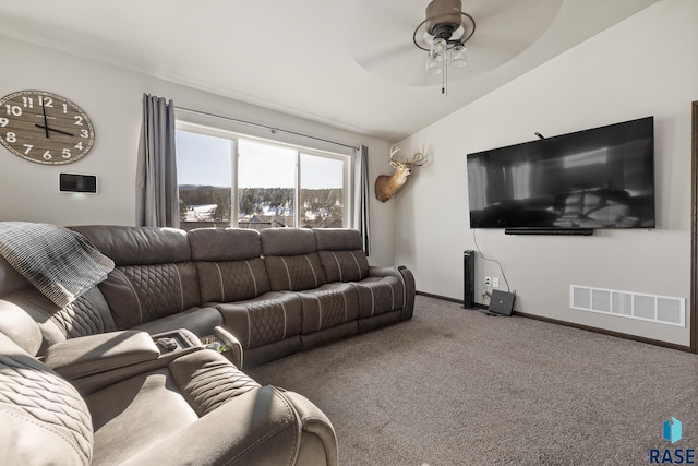 carpeted living room featuring lofted ceiling and ceiling fan