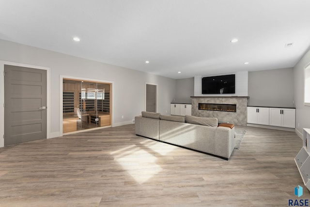 living room with light hardwood / wood-style floors