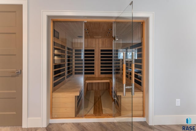 view of sauna / steam room with wood-type flooring