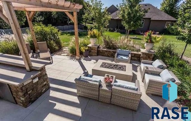 view of patio with an outdoor living space with a fire pit and a pergola