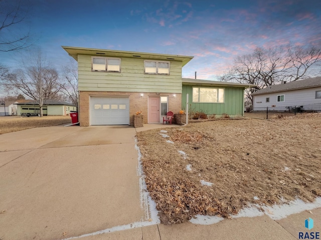 front facade with a garage