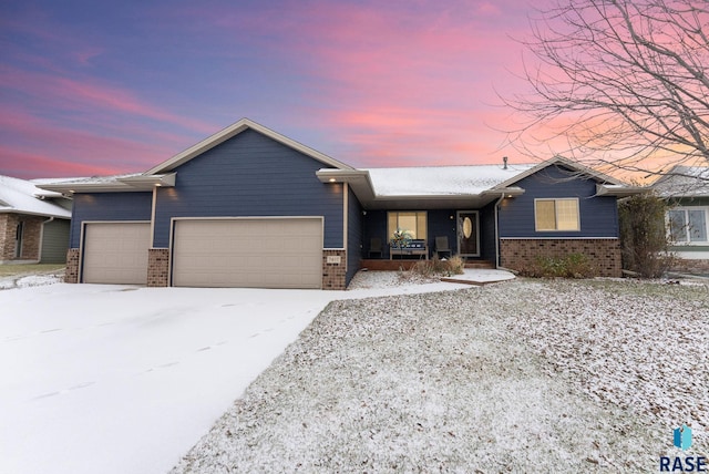 ranch-style home with a garage